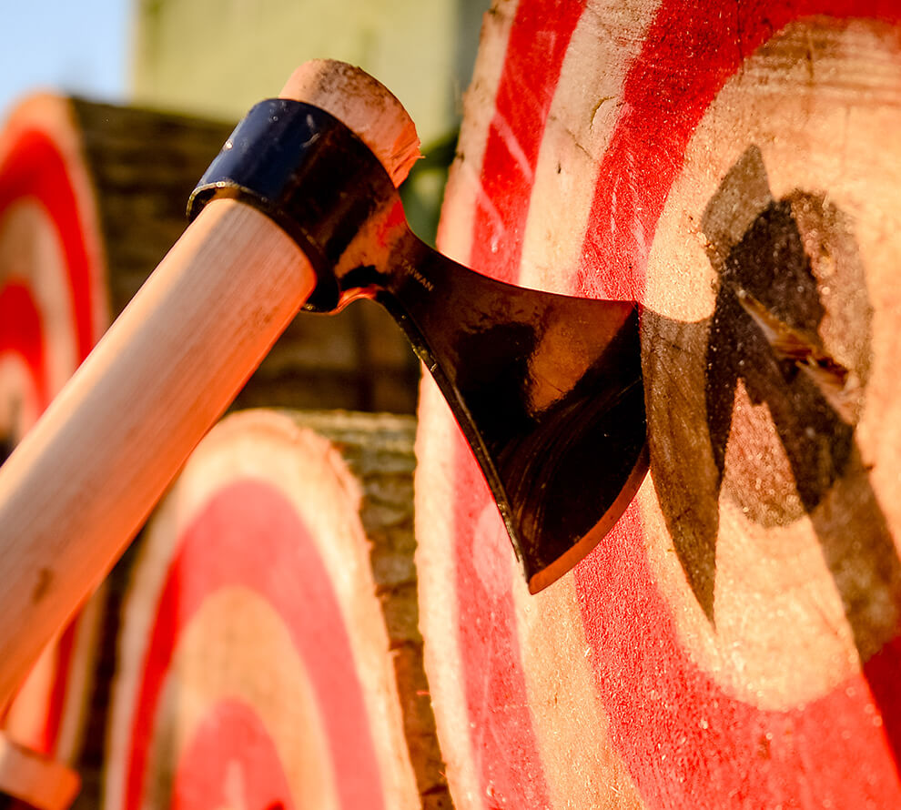 An axe stuck in a target