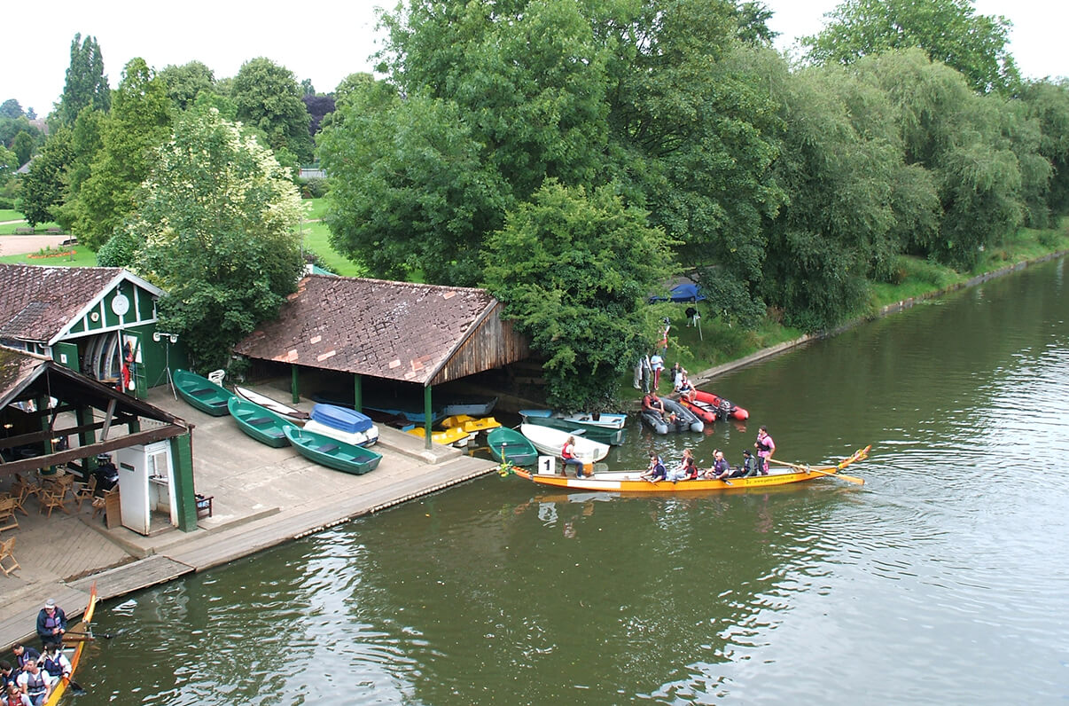 A ariel view of a team rowing a dragon boat