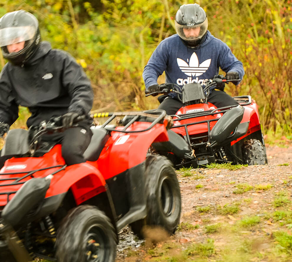 A group riding quad bikes together