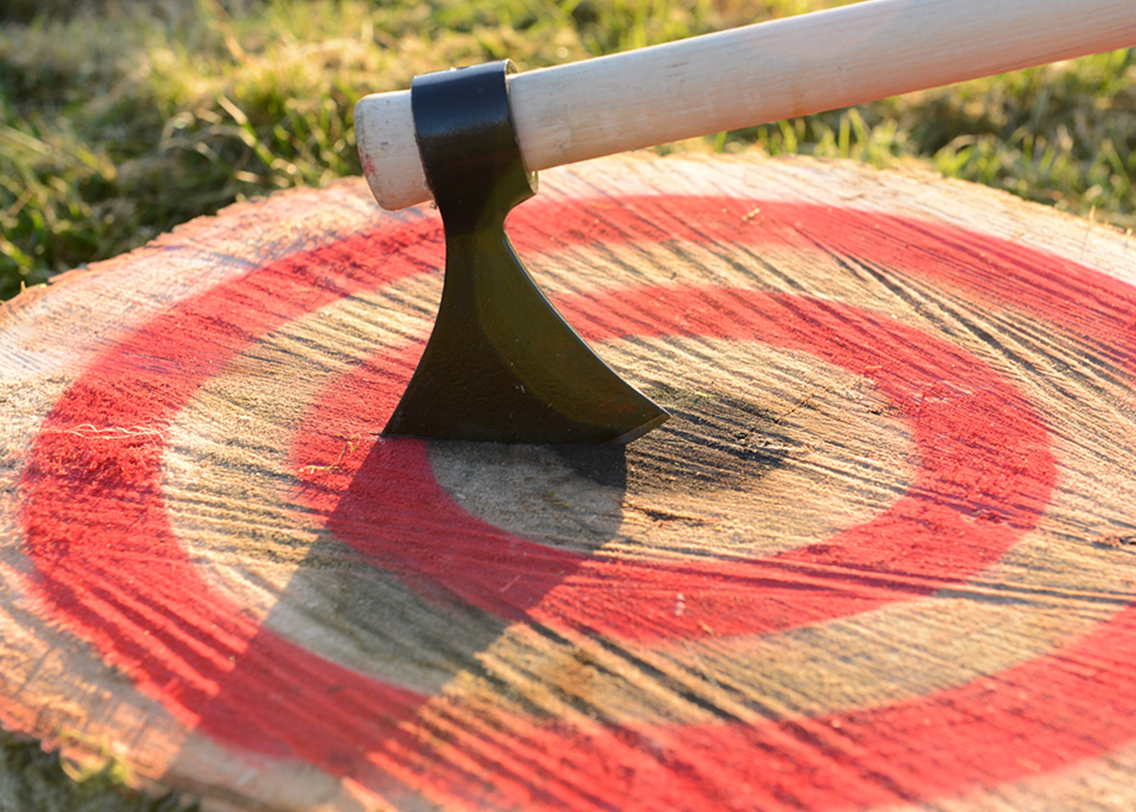 An axe stuck in a target