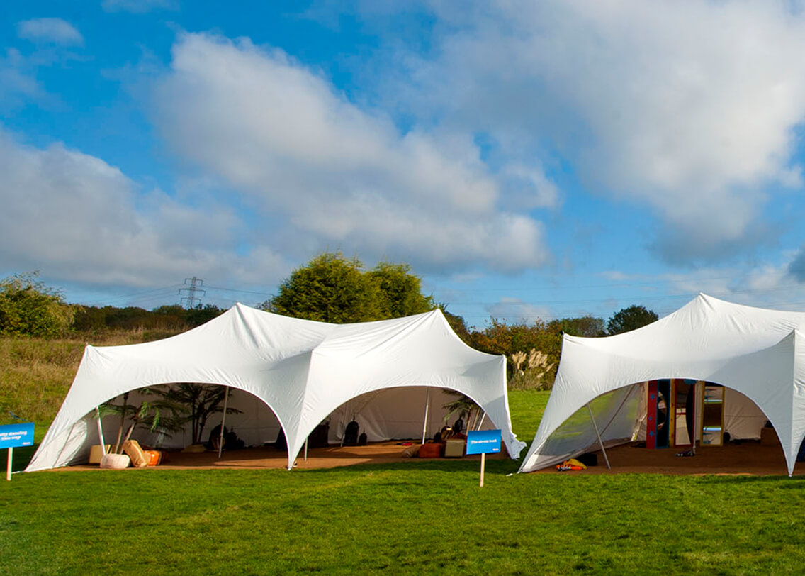 Some marquees setup in a field