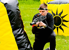 A laser tag gun being held